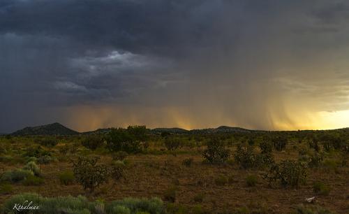 Rain at Sunset in New Mexico by Kathy Thalman